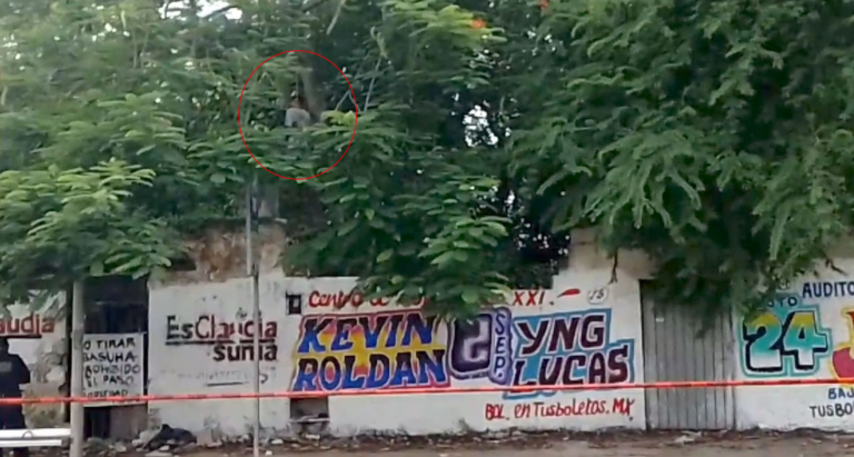 HOMBRE COLGADO EN LA AVENIDA ITZAES